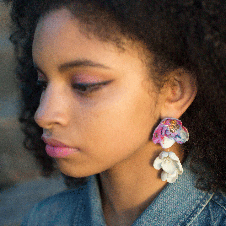 Woman in Koyu Painted Flower Earrings with Gold